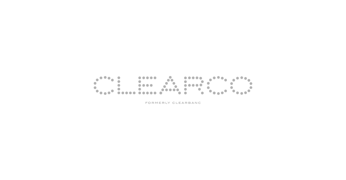 Grey text "CLEARCO" with a perforated style against a white background, reminiscent of sleek corporate photography. Smaller text below reads "FORMERLY CLEARBANC".